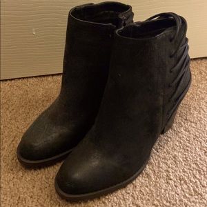 Black heeled ankle boots.